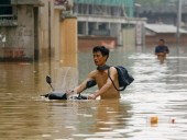 В Китае возросло число жертв из-за непогоды до 16 человек В Китае возросло число жертв из-за непогоды до 16 человек
