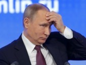 В Грузии возле здания парламента сожгли фото Путина В Грузии возле здания парламента сожгли фото Путина