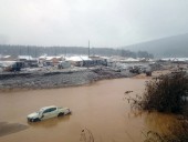 Число погибших в результате прорыва дамбы в России возросло до 15 Число погибших в результате прорыва дамбы в России возросло до 15