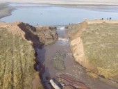 Число жертв прорыва дамбы в России возросло до 13 Число жертв прорыва дамбы в России возросло до 13