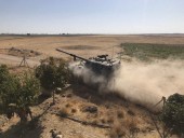 Турецкие подразделения вошли в сирийский город Телль-Абьяд Турецкие подразделения вошли в сирийский город Телль-Абьяд