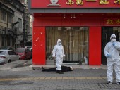Китай живет по правилу двух метров: СМИ опубликовали материал из условий полного карантина